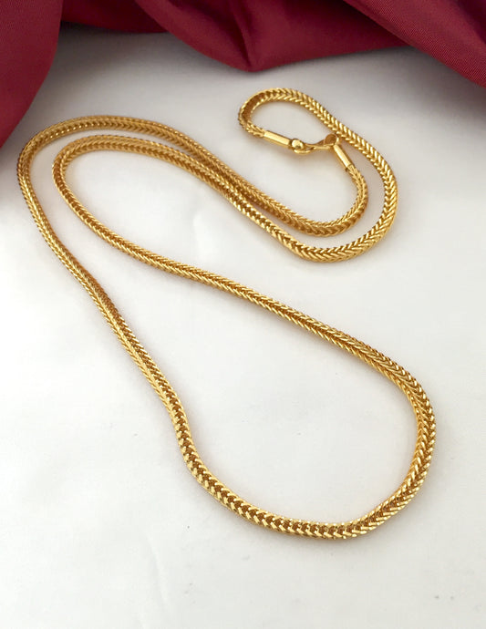 A gold chain necklace with a lobster clasp.
